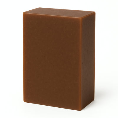 Brown rectangular bar of soap on a white background
