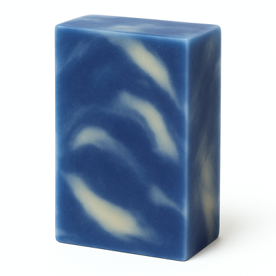 Blue and white swirled soap bar on a white background